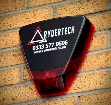 A photo of a Rydertech branded bell box for an alarm system