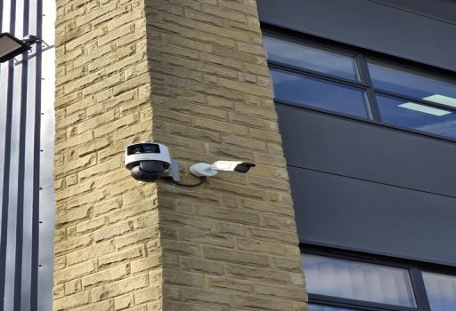 a photo of a ptz camera with and ANPR camera next to it